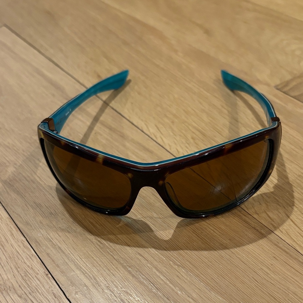 Oakley Tortoise Shell Sunglasses with Blue Accents: disobey 05-321